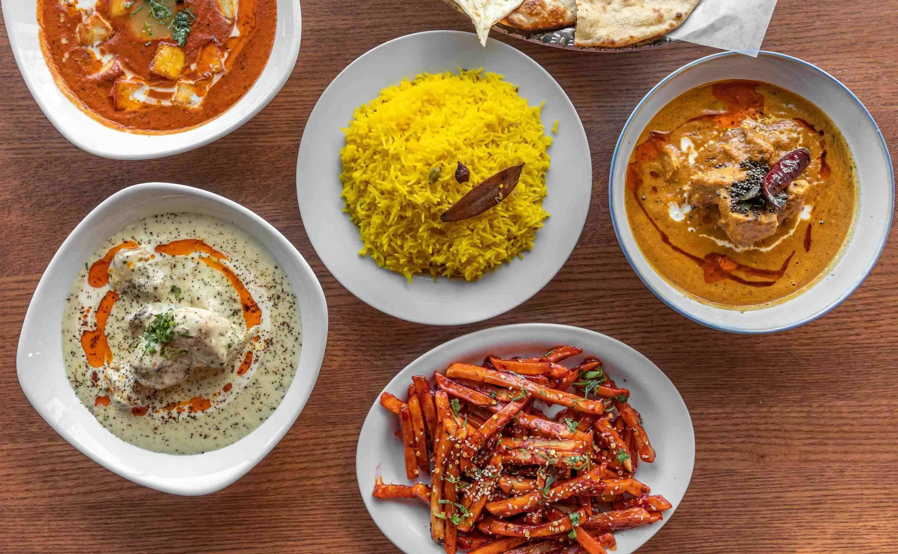 Best Indian restaurant in Pump Hill Calgary - Masala Art